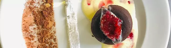 Chocolate fondant, crème anglaise and berry coulis